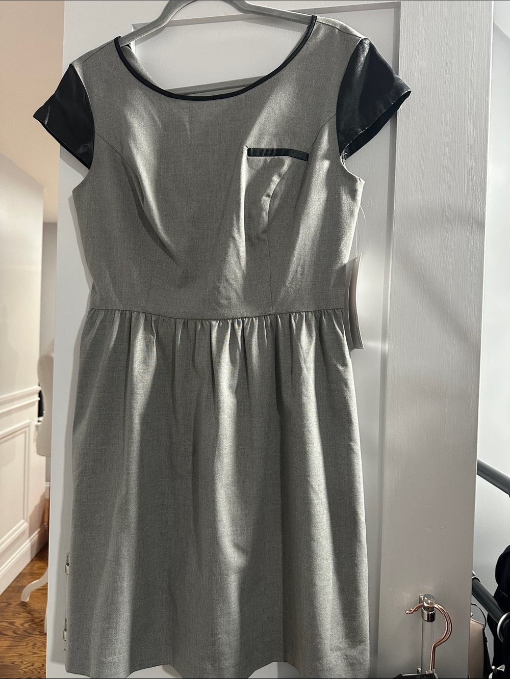 Classic Grey Fit-and-Flare Dress with Black Trim